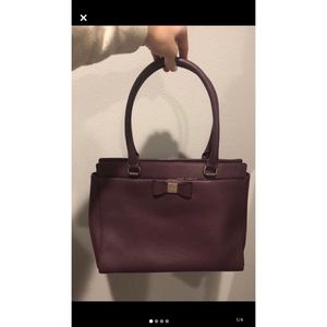 Kate Spade. Brand new. Used twice. Smoke free.